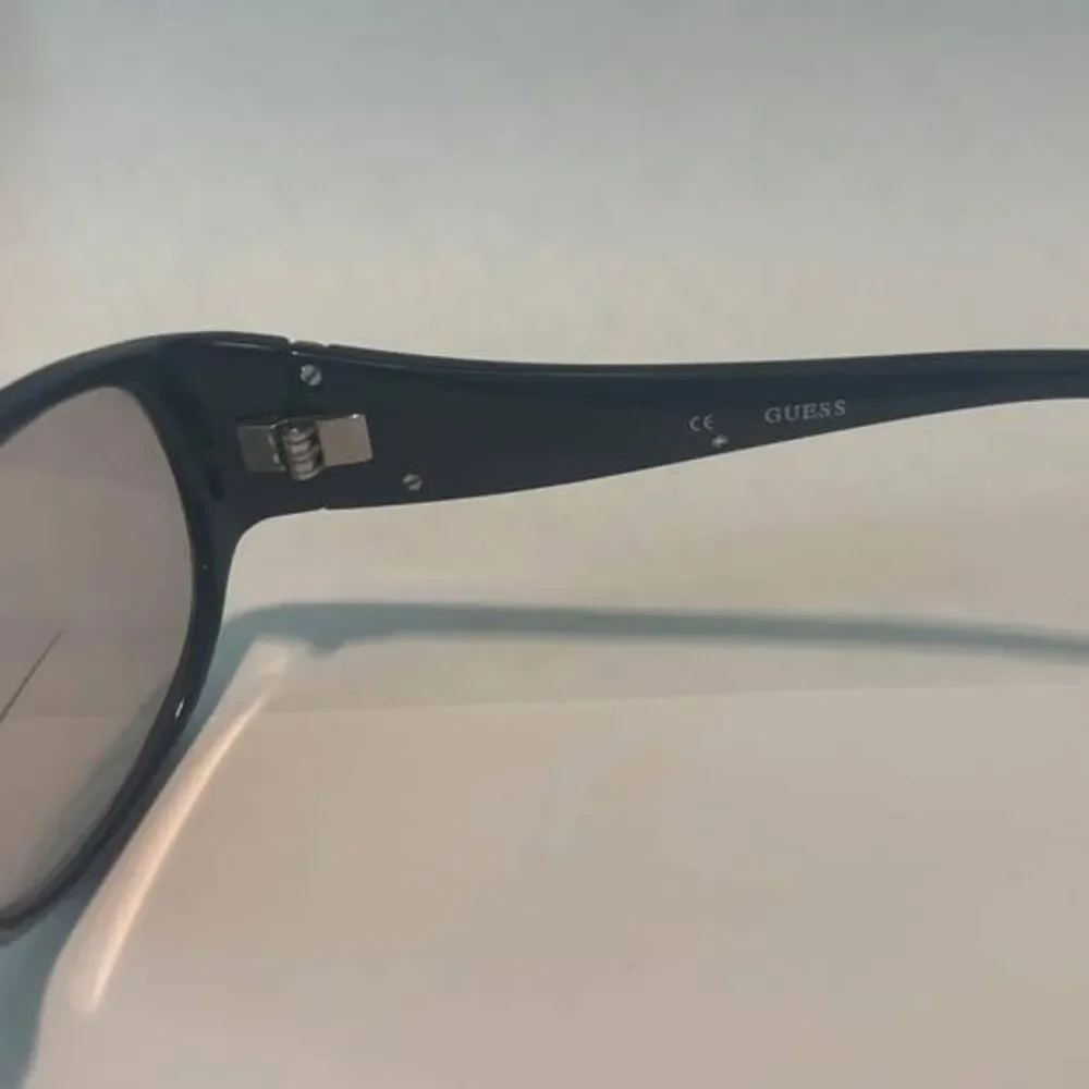 Guess designer lens